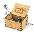 Hand-cranked wooden music box with You are My Sunshine laser engraving and floral motifs - Sunshine 02
