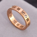 18k rose gold plated stainless steel ring with hollow Roman numerals and inset crystals - US 5 / Rose Gold