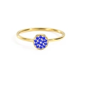 Elegante anillo de acero dorado con un pavé circular de piedras preciosas azules - US5 / Marzo Azul Claro - Color Dorado