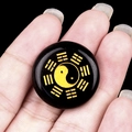 Handheld 25mm black obsidian stone pendant with golden Yin Yang Bagua carving - Obsidian