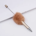 Creative champagne gold DIY beaded pen with a plush brown faux fur pom pom - Gold