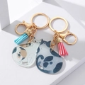 Detail of acrylic cat keychains with colorful tassels and golden alloy hooks on white - Couple Cats Acrylic Pendant 1 Pair