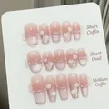 Pink ombre press-on nails with white flower art and pearls in three different shapes - 622-Short Coffin / Extra Small (XS)