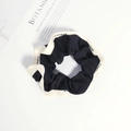 Minimalist black scrunchie with white 'CHANGE' letter print trim for hair styling - Black