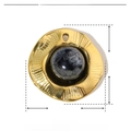 Macro shot of gold stainless steel sunburst pendant with dark grey natural stone inlay - YE105-Round Gold Radial Gray Stone
