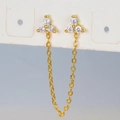 Macro detail of gold chain earrings with sparkling clear cubic zirconia flower studs - Gold White Rhinestone