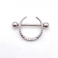 Macro shot of silver stainless steel nipple shield with cubic zirconia row setting - Steel - Single Row Zircon Shield