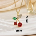 Detailed view of the 27mm cherry pendant necklace with red and green zircons - Gold Tone Cherry (XL0570)
