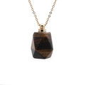 Detailed view of tiger eye stone perfume bottle pendant with golden chain hardware - Tiger Eye Perfume Bottle (Gold Chain)