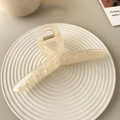 Elegant cream acrylic hair claw clip for thick hair displayed on a ceramic tray - Jelly Mermaid-15cm