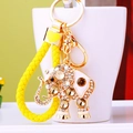Macro detail of elephant keychain with sparkling crystals and yellow braided leather cord - Single OPP Bag Packaging / Yellow Rope + Champagne Crystal Elephant