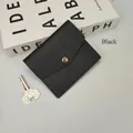 Slim black faux leather minimalist card holder wallet with elegant gold snap button - Black