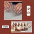 Detail view of coffee brown trapezoid press-on nails with gold glitter, model W038 - W038 Lattice Gradient