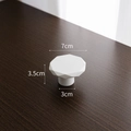 White geometric jewelry display stand with dimensions 7x3.5cm on dark wood texture - Low Pedestal Beveled Round Tray