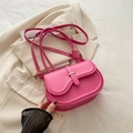 Minimalist bright pink saddle bag with golden metal bar and knotted shoulder strap - Rose Pink