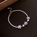 Sparkling zircon twisted horseshoe bracelet with pink flower accents in silver finish - 36# Bracelet-Silver & Pink-Pink & White Floral Tennis Style