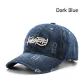 Cappellino da baseball in denim blu scuro con ricamo vintage ed effetto lavato - Blu scuro