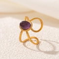 Macro detail of 18K gold ring featuring a purple oval stone and split band design - Forked Purple Stone Style (2549-9)