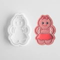Gingerbread man cookie cutter set with white plastic mold and pink decorated cookie - Gingerbread Girl B