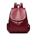 Elegant wine red leather backpack for women with flap design and a polished finish - Regular Fit / Red