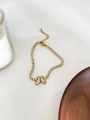 Bracciale tennis dorato con ciondolo a farfalla in conchiglia bianca e strass lucidi - Farfalla dorata
