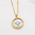 Collar giratorio bicolor chapado en oro 18k con colgante de paloma de la paz y circón - Paloma de la Paz