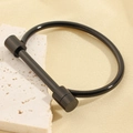 Bracelet fer à cheval en acier inoxydable noir poli avec fermeture à barre de vis élégante - Noir