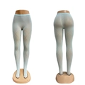 Detail view showing light blue hollow diamond pattern stockings on a leg model - One Size (45-75kg) / Mint Green