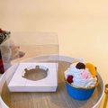 Blue cupcake scented candle with cream topping in a clear gift box packaging - 1 Piece Orange Style