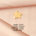 Detailed specs for gold star pendant with zircon, size 11x12.6mm on pink silk background - Gold