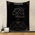 Detailed macro view of black Aquarius zodiac tapestry hanging on a minimalist wall - Aquarius