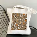 White canvas tote bag featuring nurse theme medical illustrations on a black chair - Style C9 (No Inner Pocket/No Zipper)