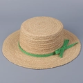 Detailed view of raffia sun hat showing woven texture and green ribbon bow decoration - M(56-58cm) / Green