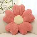 Pink macaron flower plush chair cushion with ribbed velvet texture on a white sofa - Pink