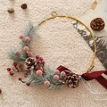 Golden Christmas wreath with LED lights, pine cones, red berries and burgundy ribbon - Metal Pine Cone Wreath With Light