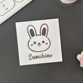 Square cartoon rabbit sticker with Sunshine text in brown line art on white base - Metallic Silver (Long Ear Rabbit)