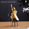 Elegant white and gold ballet dancer figurine sitting on a stool home decor statue - Gold Ballet Sitting Chair