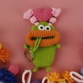Handmade green crochet monster key case with large orange lips and pink heart decor - Green