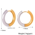 Macro shot of 18mm two-tone stainless steel hoop earrings in gold and silver finish - Two-tone 18mm