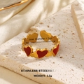 Gold plated stainless steel open ring with red enamel heart shapes in a linked design - Row Of Hearts Sweet Style (1274)
