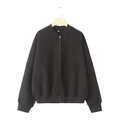 Detail of classic black zip-up bomber jacket with ribbed collar and cuffs on wood hanger - Black Top