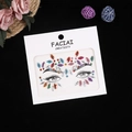 Detailed close-up of colorful facial rhinestone stickers with sequins on black background - Multicolor AB