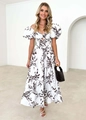 Detailed view of the hollow waist design and coffee floral print on a white maxi dress - S / Black and White Print