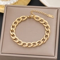 Macro view of 18k gold plated chunky chain bracelet on a jewelry box with 18KGP stamp - Gold Chunky Chain Style (524)