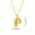 Dettaglio dimensioni del ciondolo a forma di lettera P a palloncino oro 1,1cm x 1,3cm - Lettera P