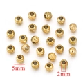 Macro detail of 5mm gold plated stainless steel wheel beads with textured spiral finish - Ball-Gold / 5x2mm