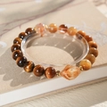 Macro detail of tiger eye stone bracelet with amber gemstones and gold metal spacers - Citrine Tiger Eye Bracelet (Exquisite Gift Box)