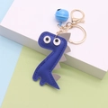 Blue PU leather dinosaur keychain with golden bell and hook on geometric background - Blue