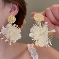 Detailed view of cream fabric flower earrings with textured gold metal and tassels - 35# Silver Earring Post - Gold - White