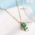 Collana dorata con ciondolo a fiore in zircone verde e catena a maglie piatte da donna - Verde Rotante